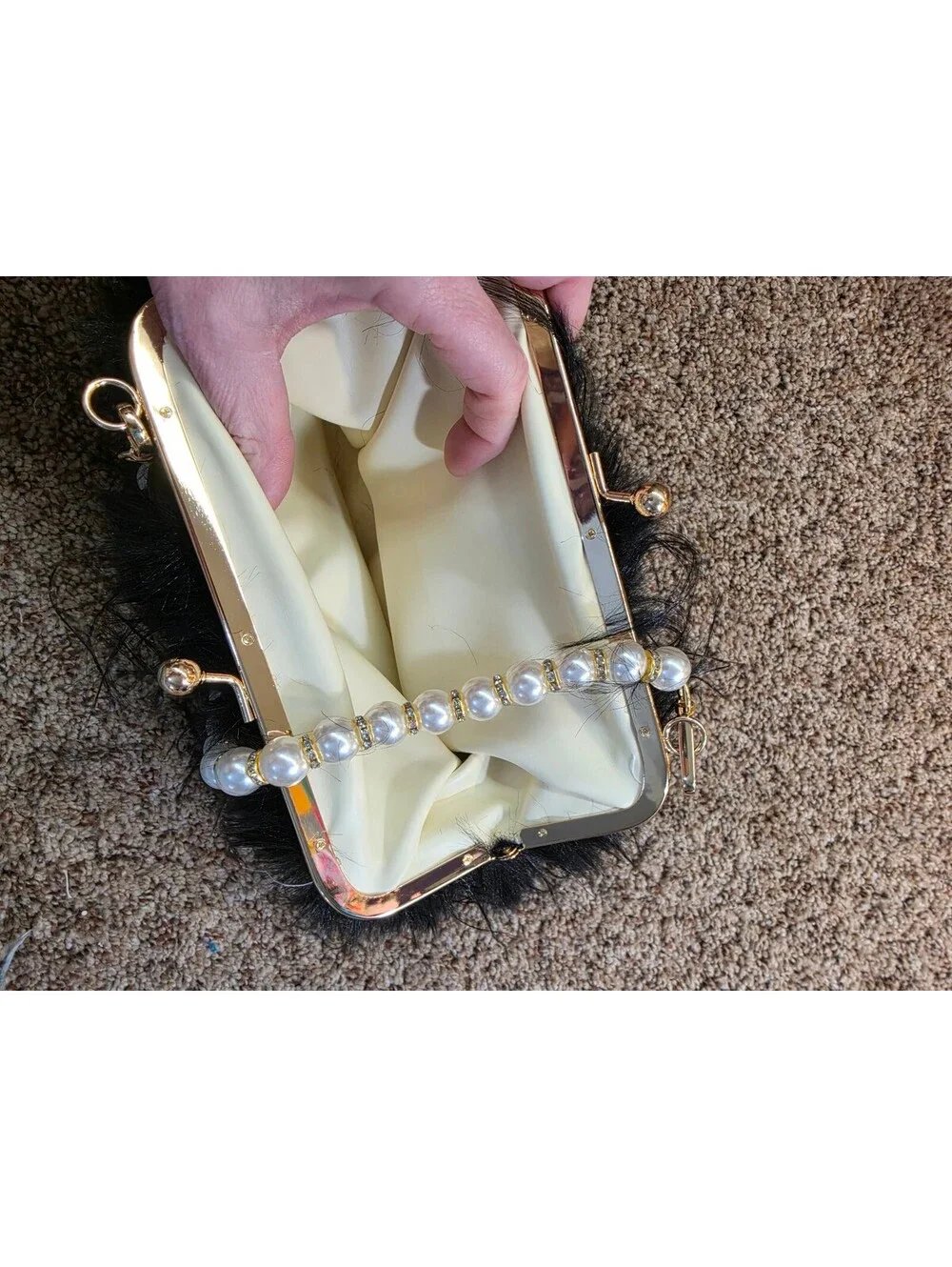 Elegant Black Faux Fur Clutch Bag with Pearl Handle and Gold Frame